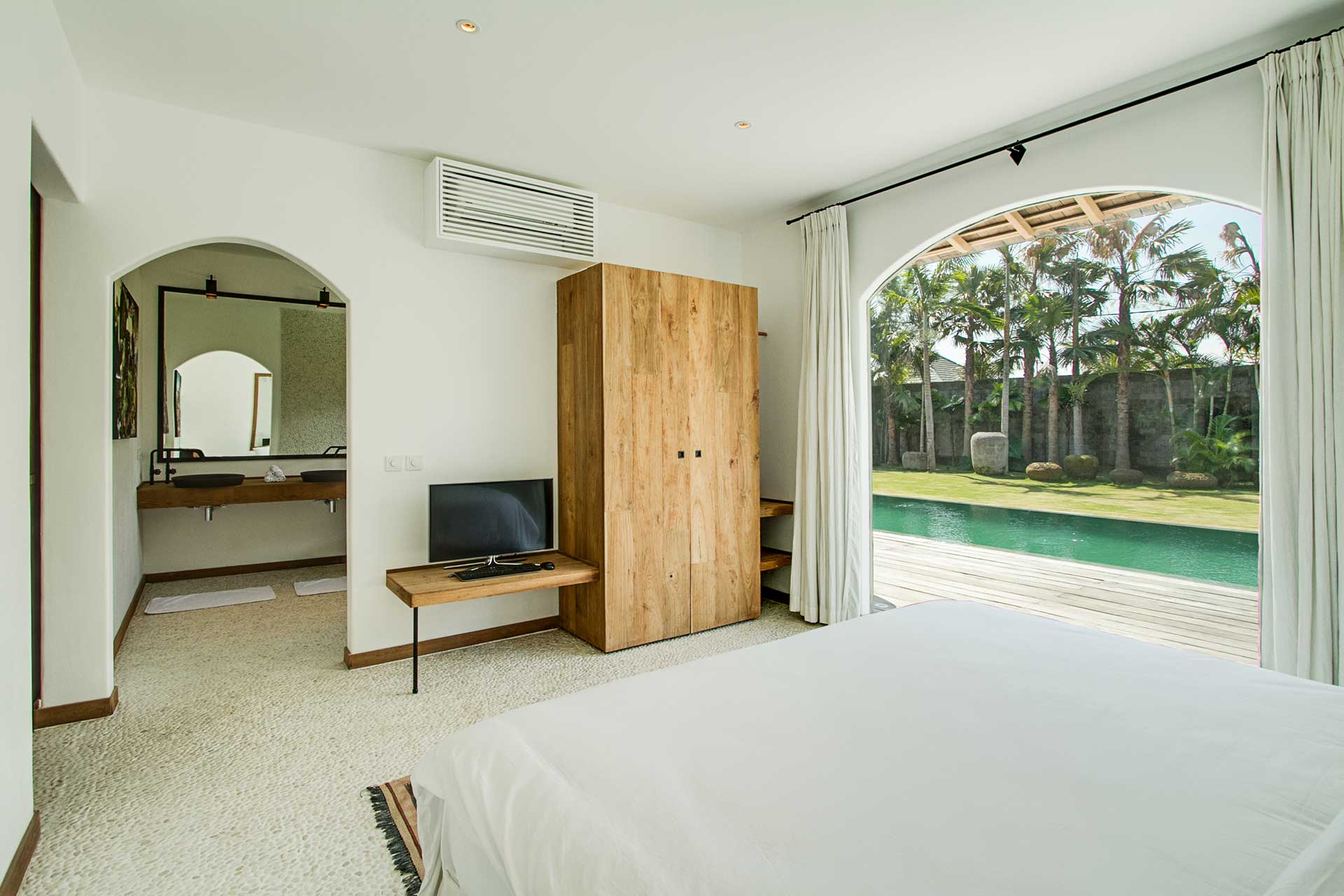 Main Villa Pool View Room, plenty of closet space and a private bathroom